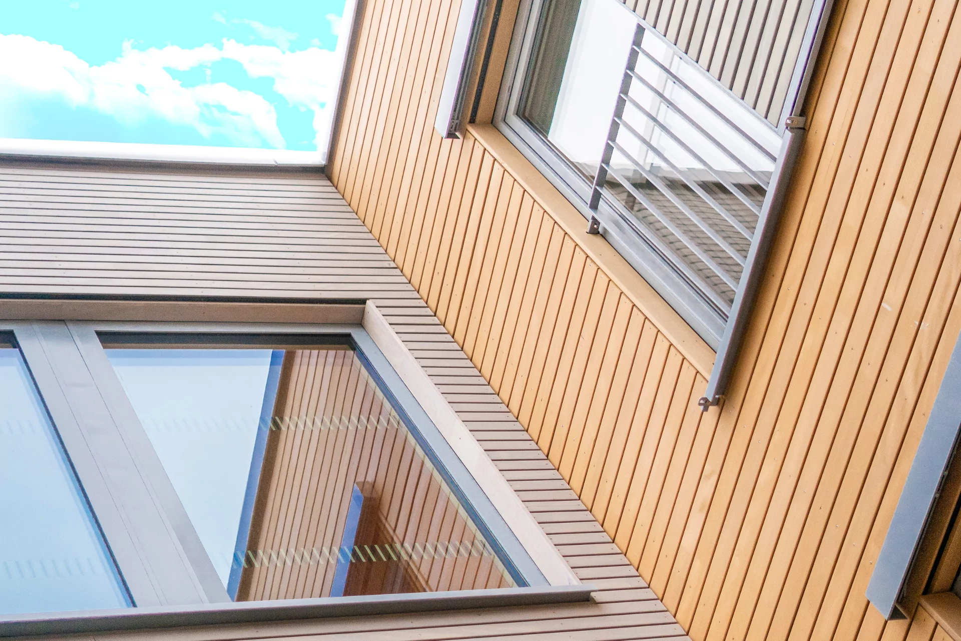 a building with a window and a railing