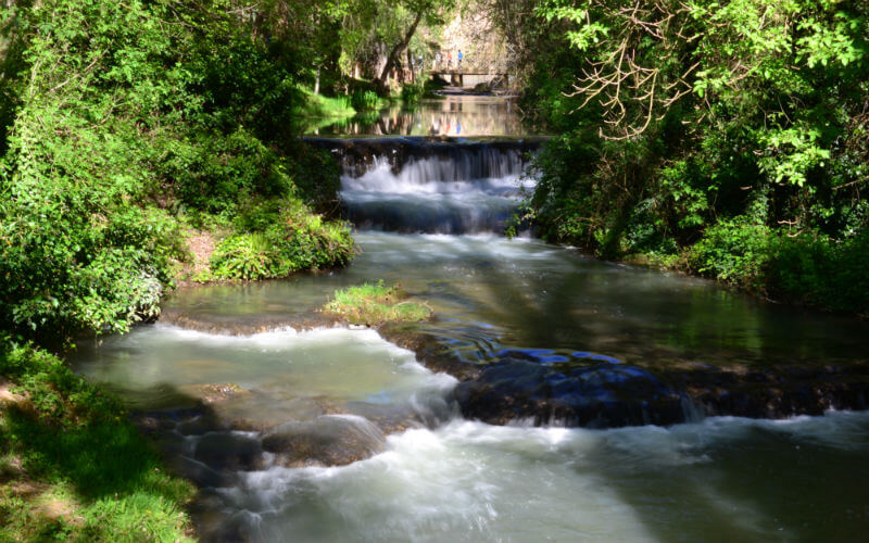 a river with a waterfall