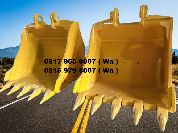 a yellow buckets on a road