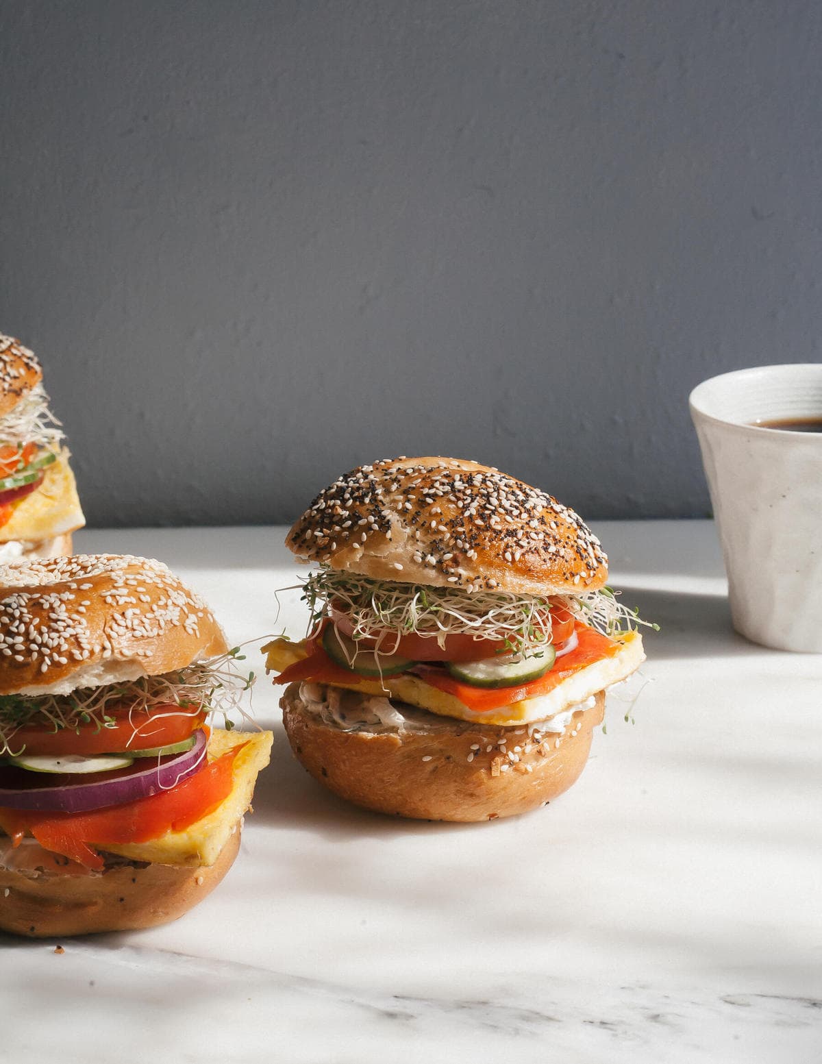 a group of sandwiches with a cup of coffee