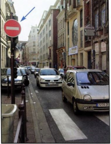 cars on the street in a city