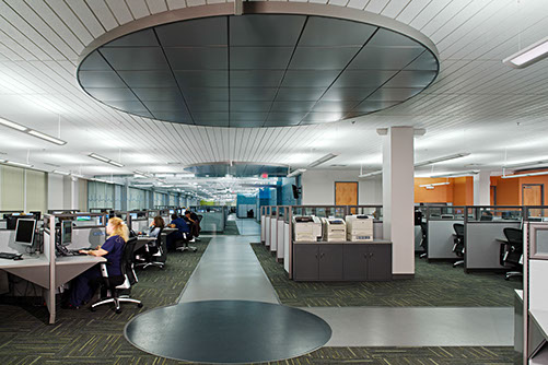 a group of people working in an office