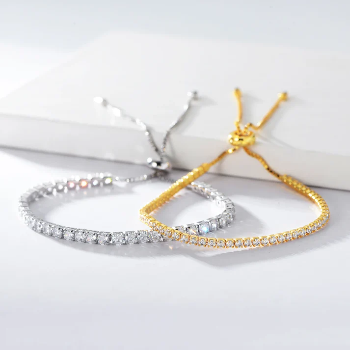 a pair of bracelets on a white surface