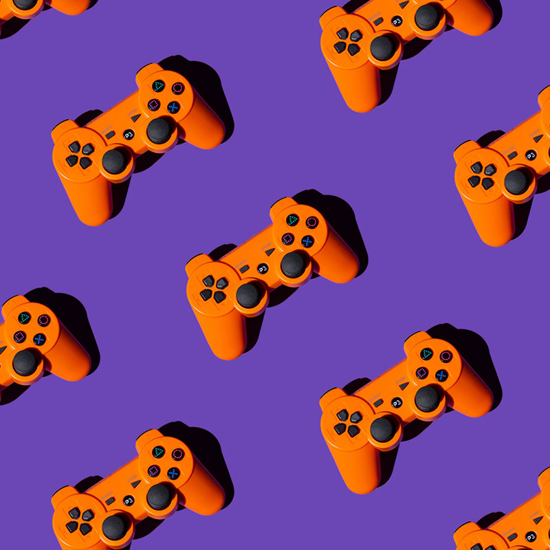 a pattern of orange game controller
