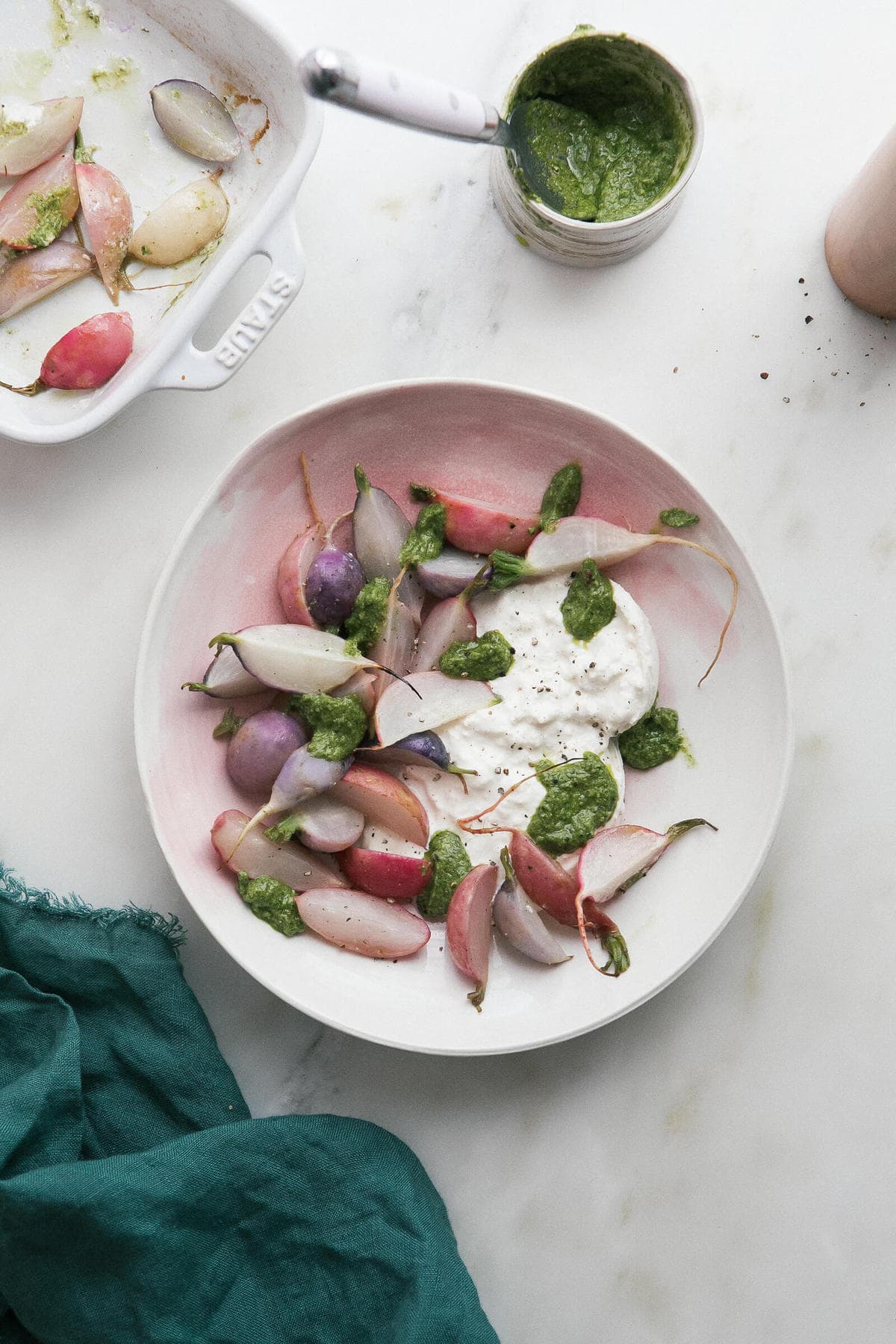 a bowl of food on a marble surface