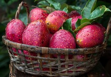 a basket of fruit with water drops on it