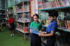 a group of children in a library