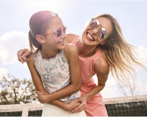 a woman and a girl wearing sunglasses