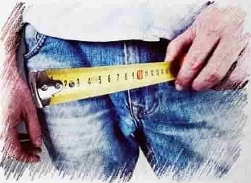 a person measuring their waist