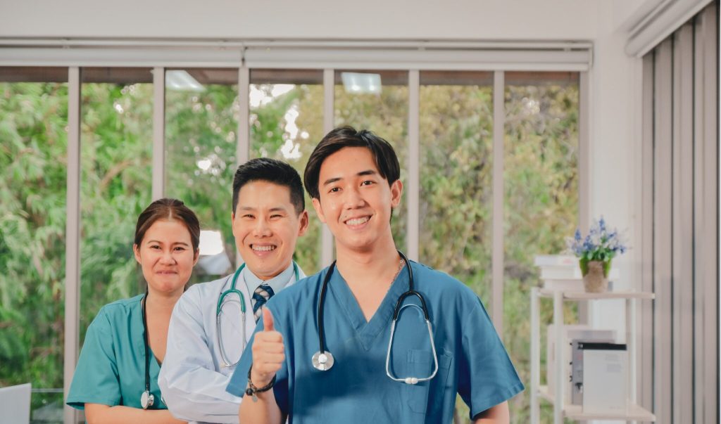 a group of people in scrubs