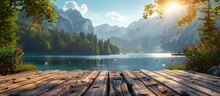 a wooden deck with trees and water in front of mountains