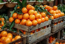 a group of oranges in wooden crates