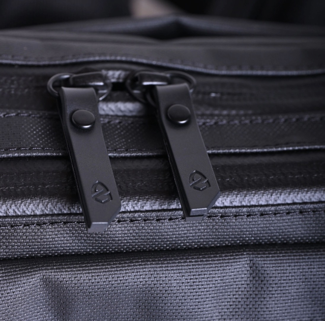 a zippers on a black bag