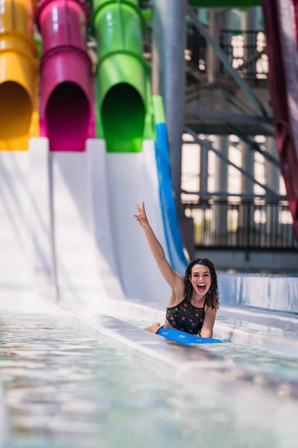 a woman on a water slide