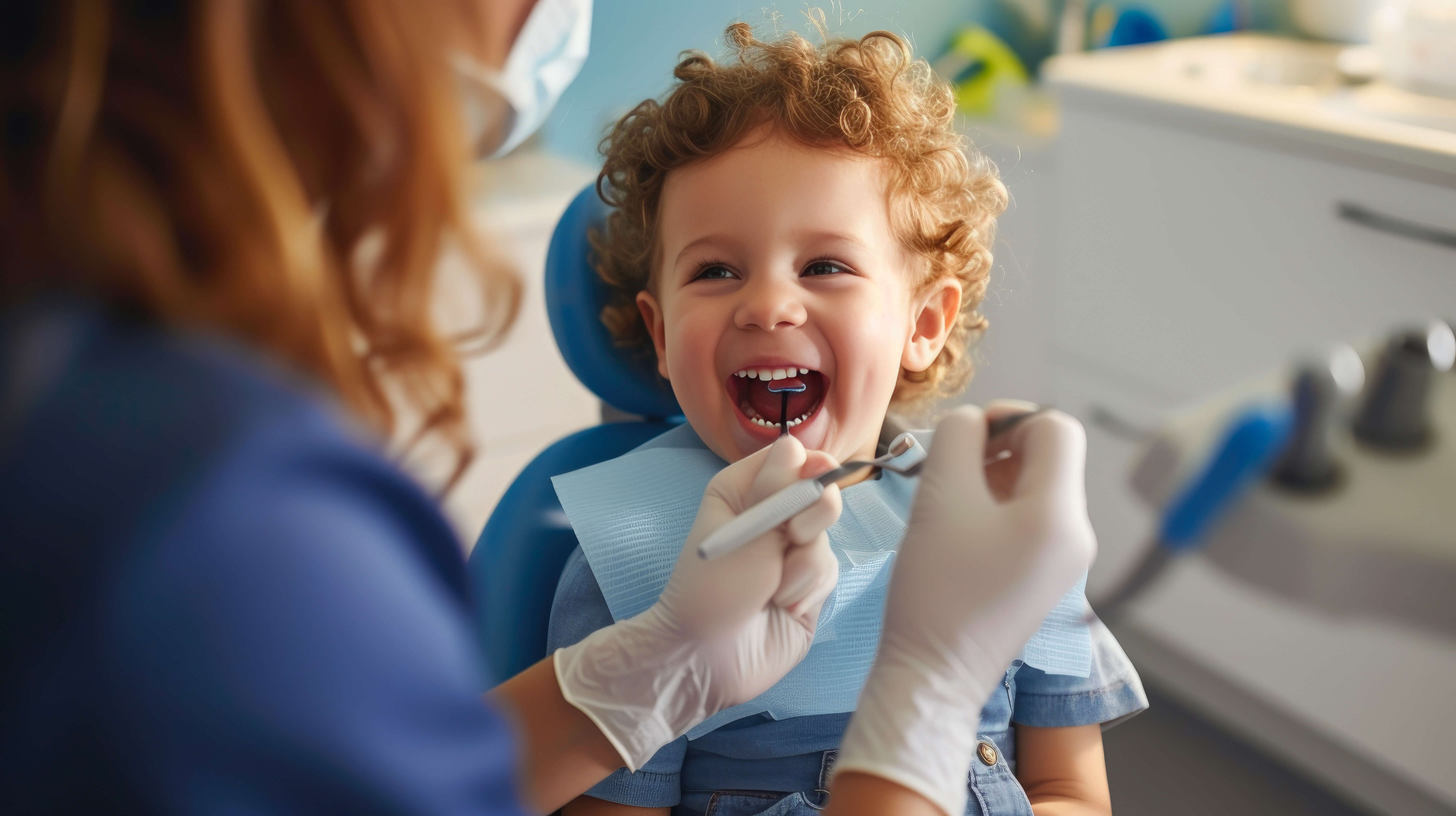 a child in a dental chair