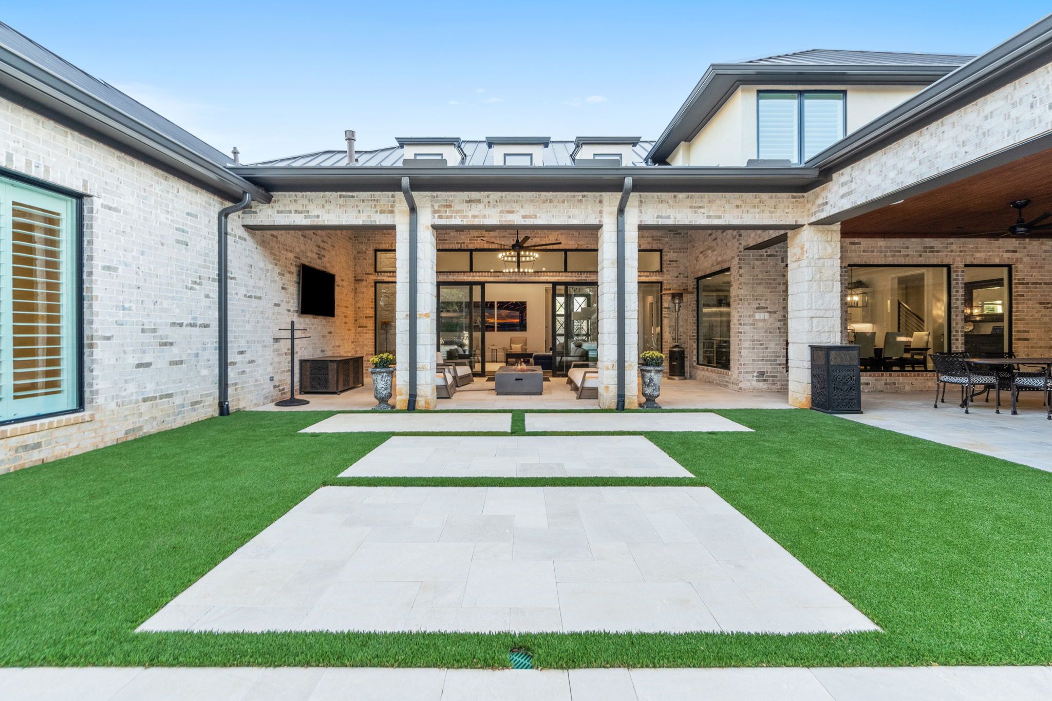 a house with a lawn and patio