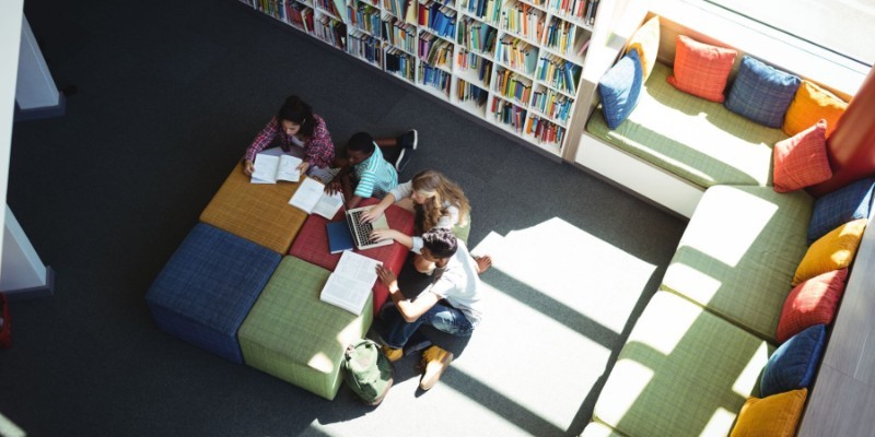 high angle view of people studying in a library