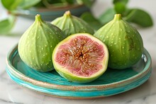 a plate of figs on a table