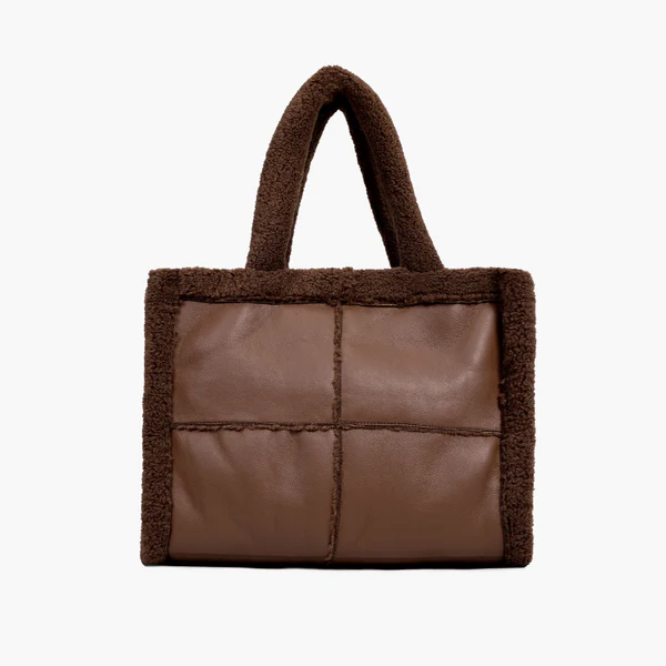a brown bag with a square design