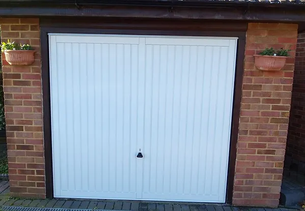 a white garage door with a lock
