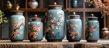 a group of jars with flowers on them