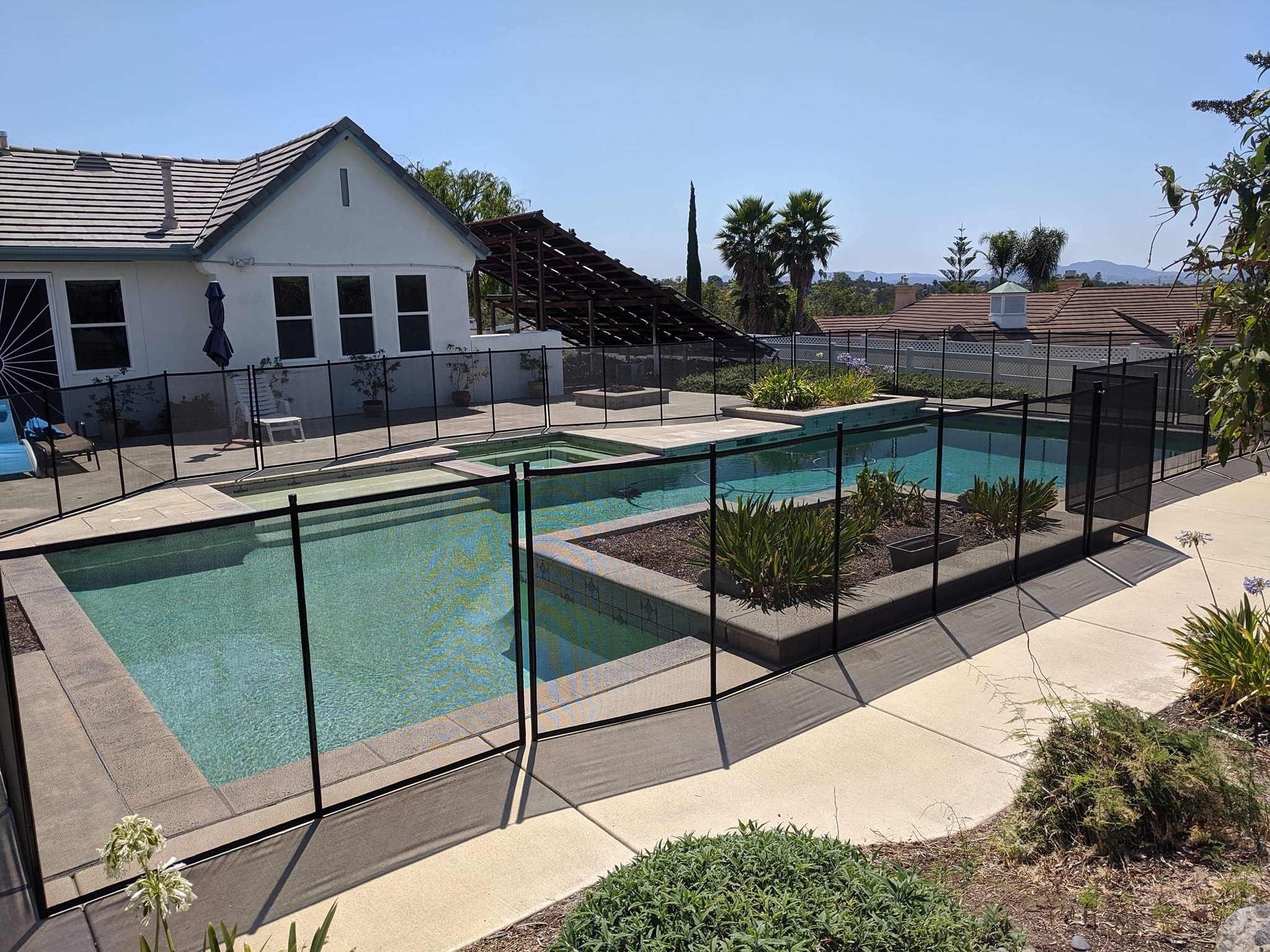 a pool with a fence around it