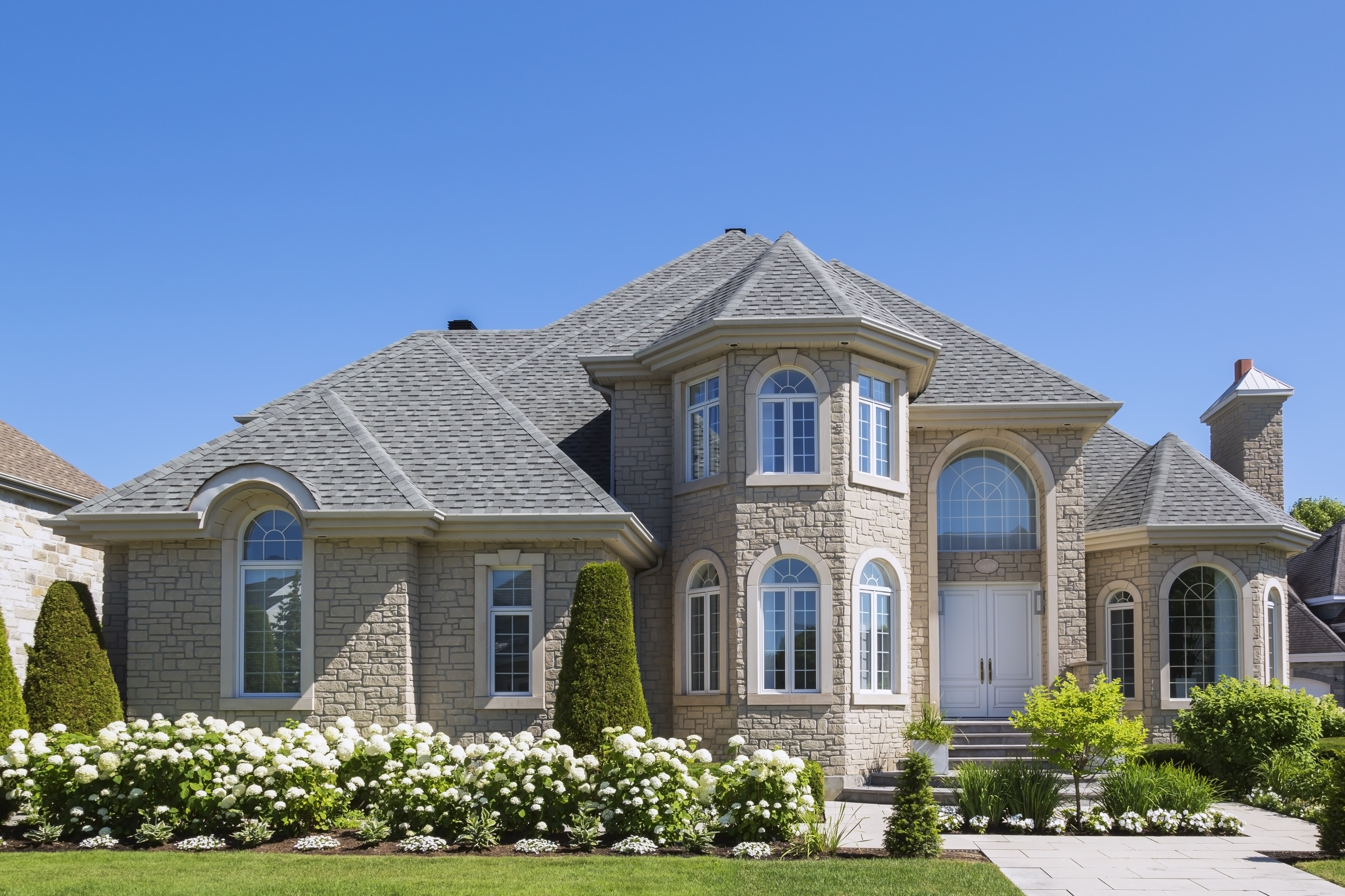 a house with a garden and a driveway