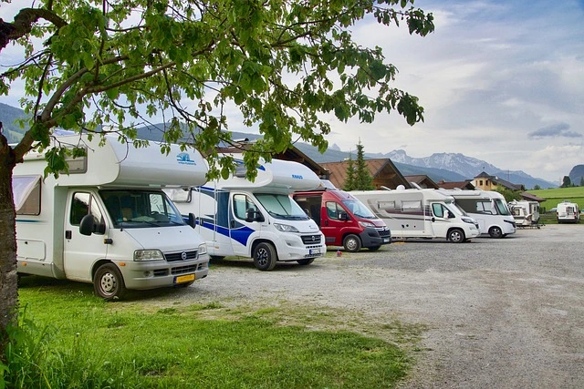 a group of rvs parked in a parking lot