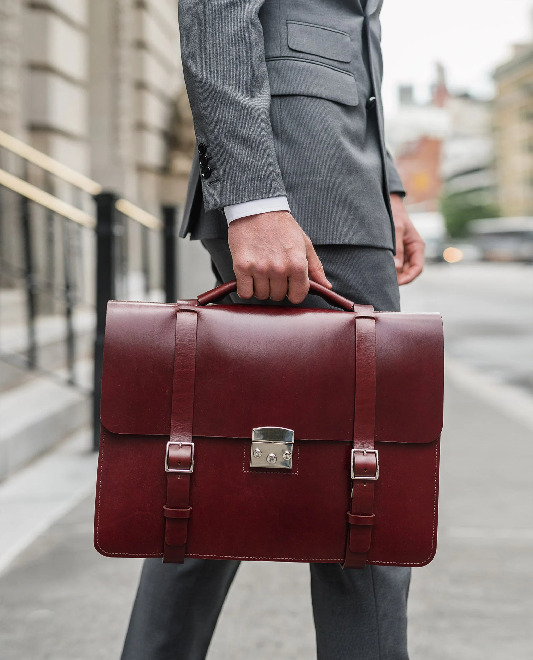 a man in a suit holding a briefcase