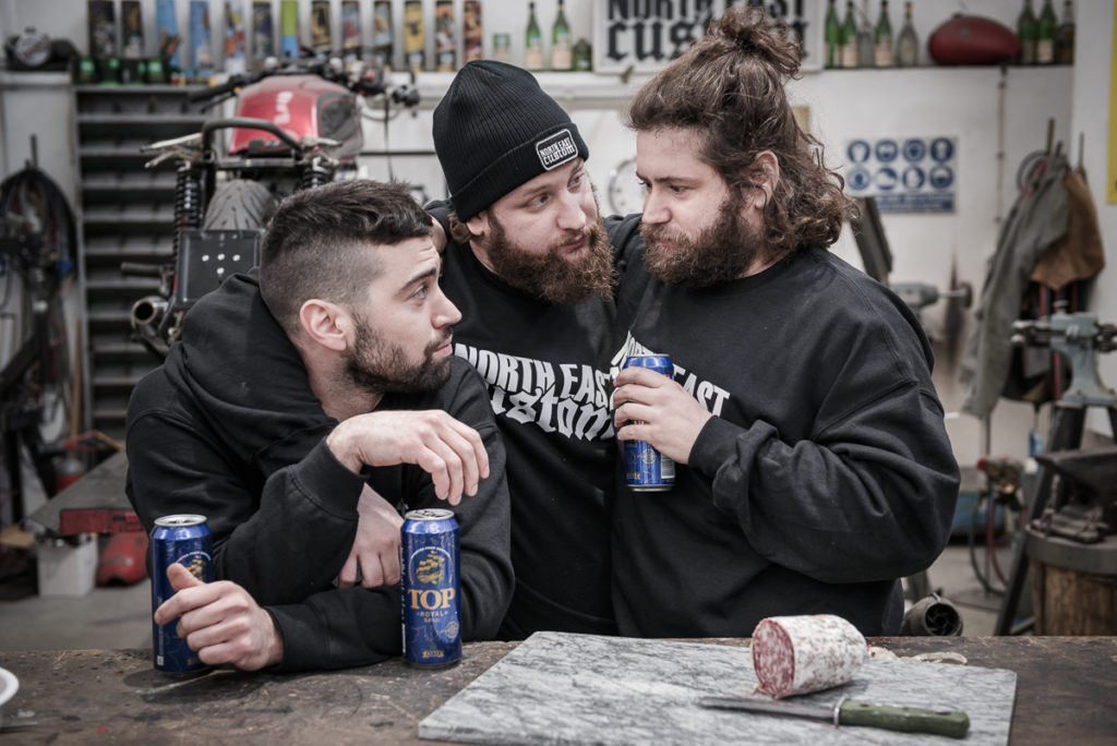 a group of men with long hair and beards