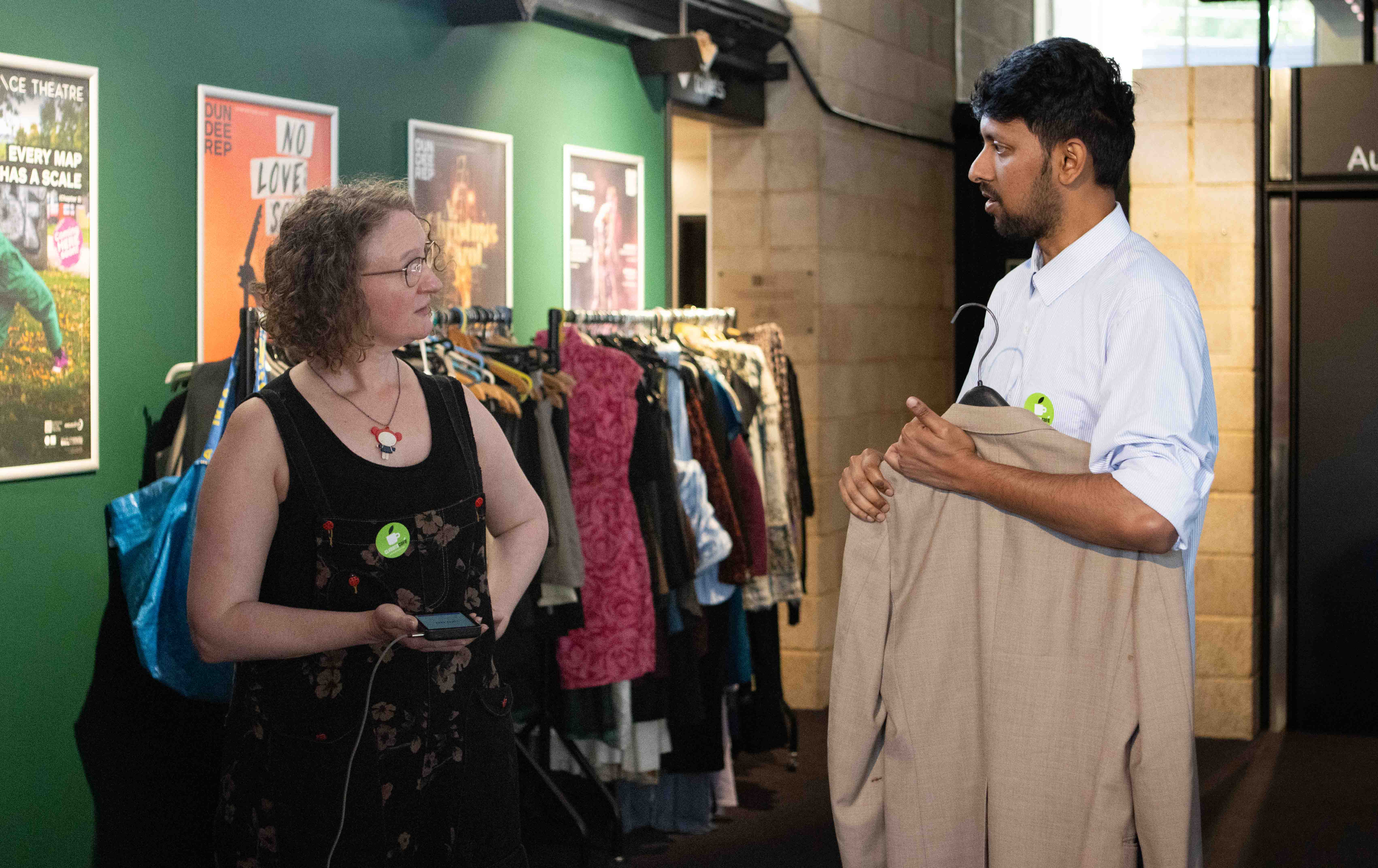 a man and woman standing in a store