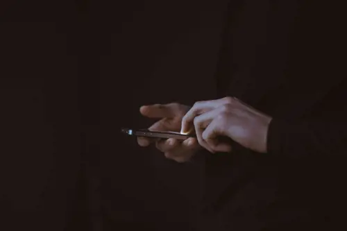 a person holding a cell phone