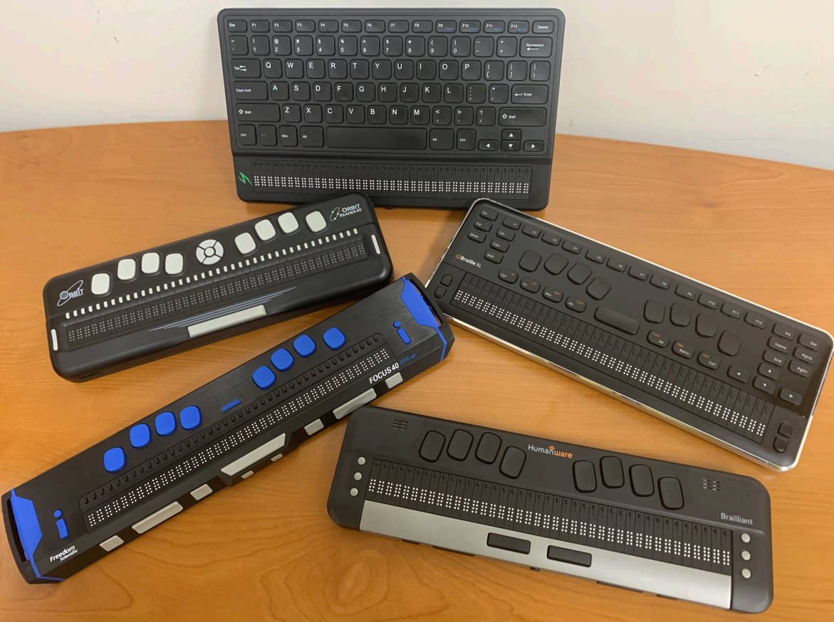 a group of keyboards on a table