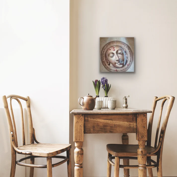 a table with chairs and a painting on the wall