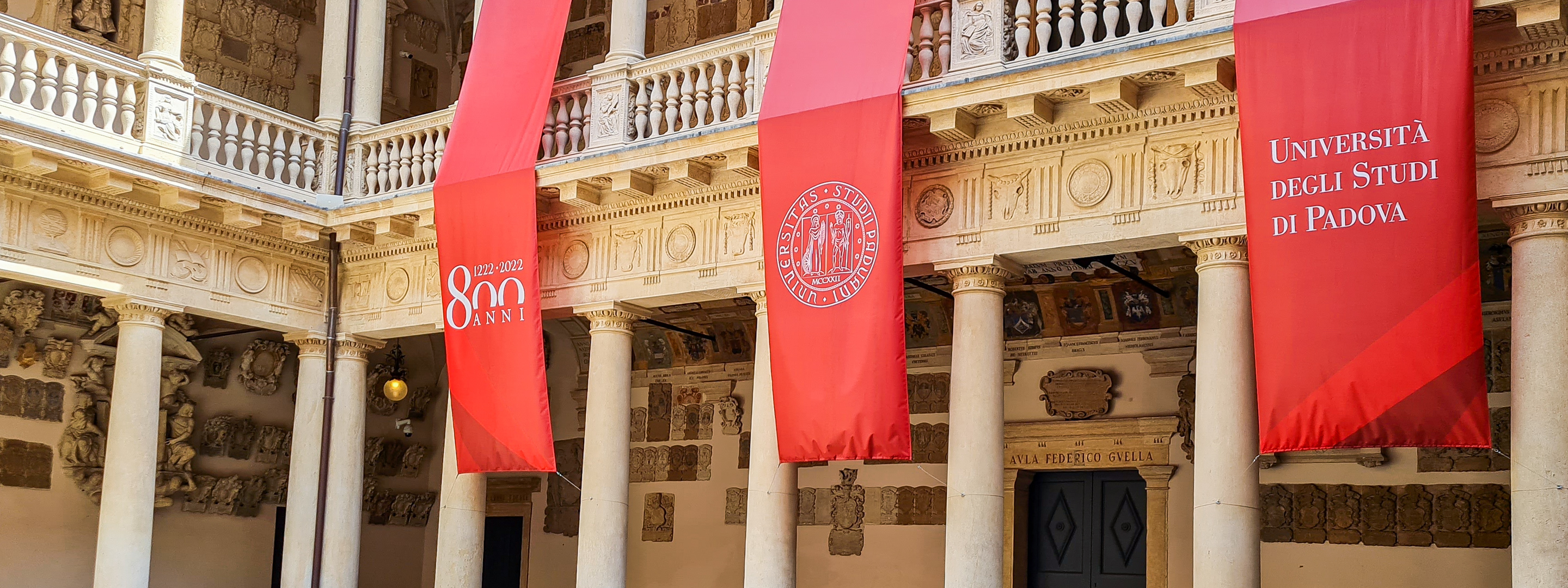 a building with red banners