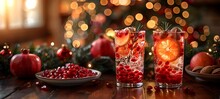 a glass of red liquid with fruit on a table