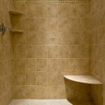 a shower with a bench and shelves