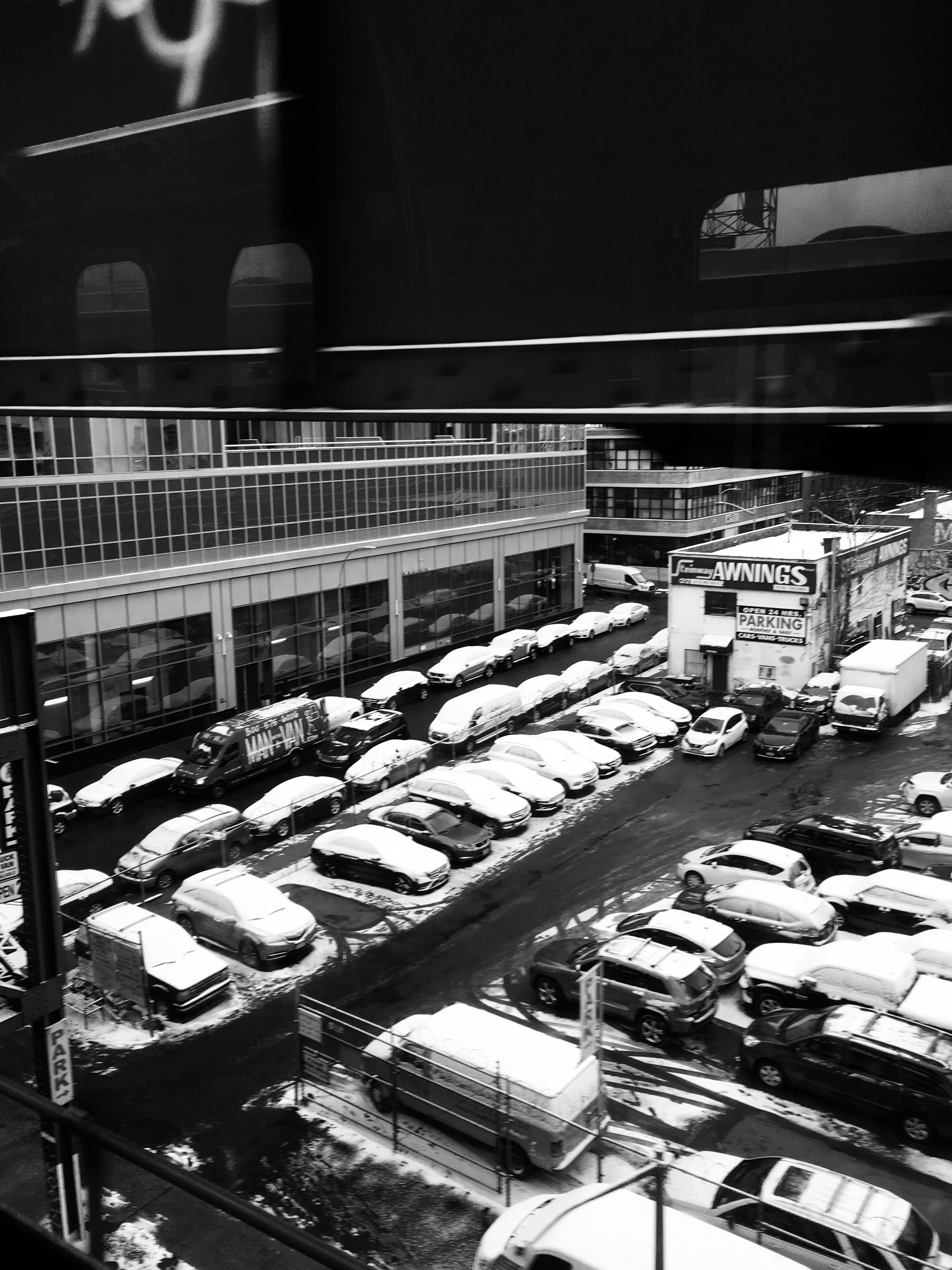 a parking lot with cars in it