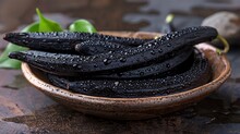 a bowl of black food