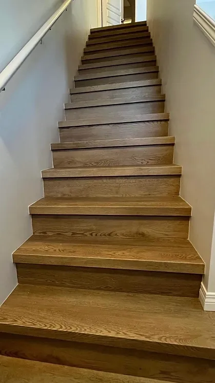 a wooden stairs in a house