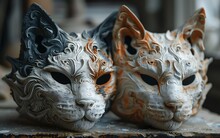 a pair of cats masks