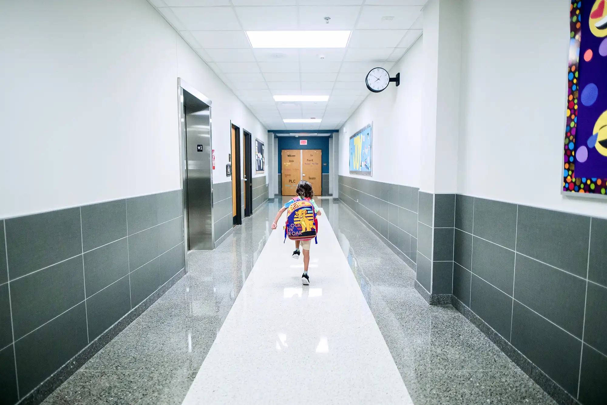 a child running in a hallway