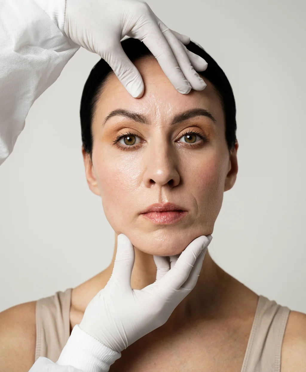 a woman with a face massage