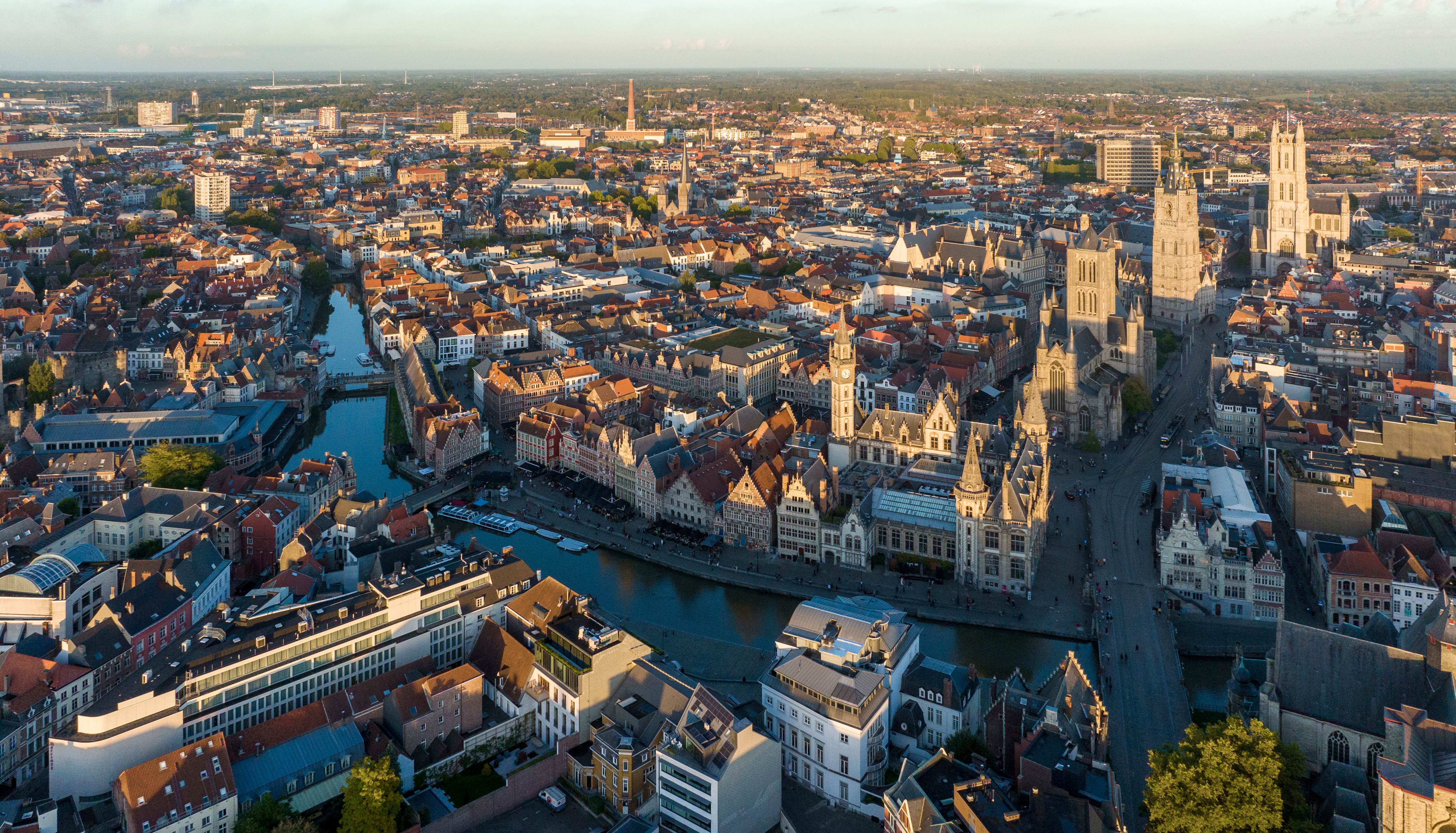 a city with a river and buildings