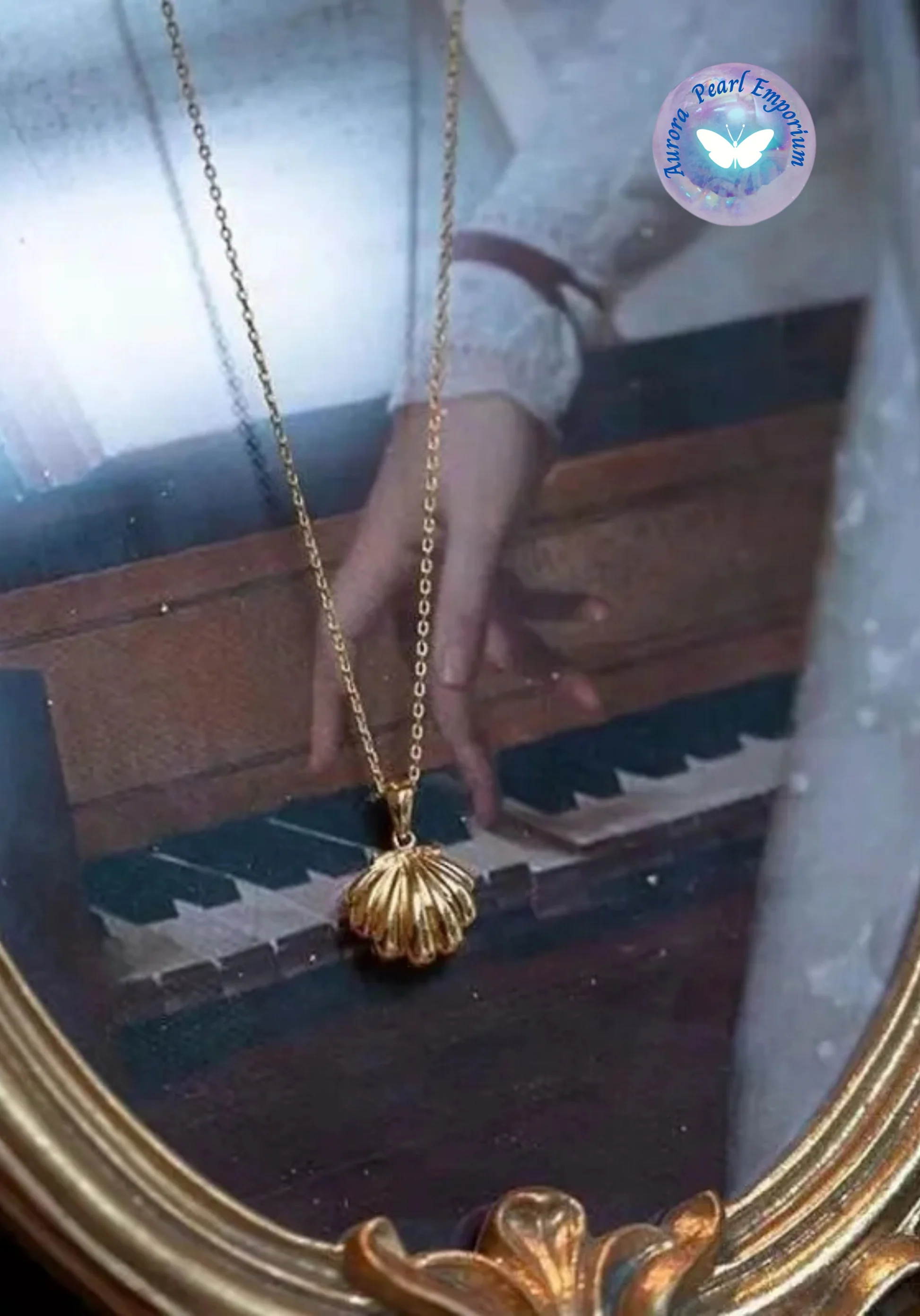 a gold necklace on a chain