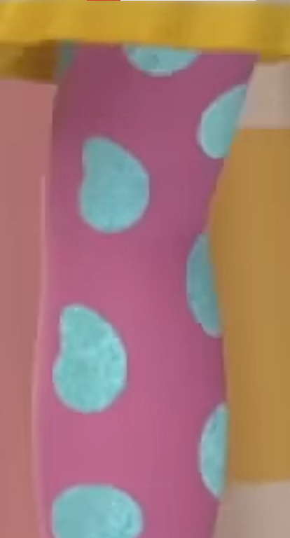 a pink and blue polka dot sock