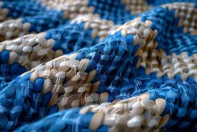 a close up of a blue and white fabric