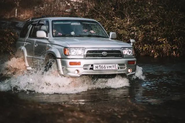 a car driving through water