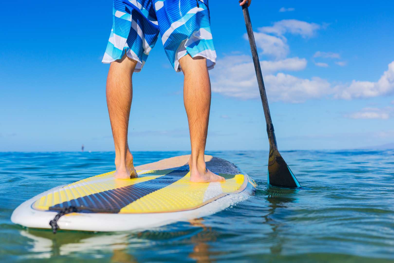 a person on a surfboard in the water