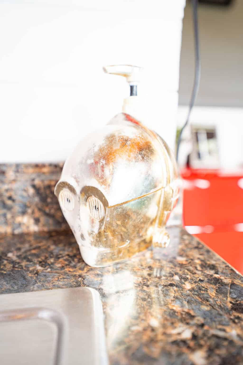 a plastic robot head on a counter